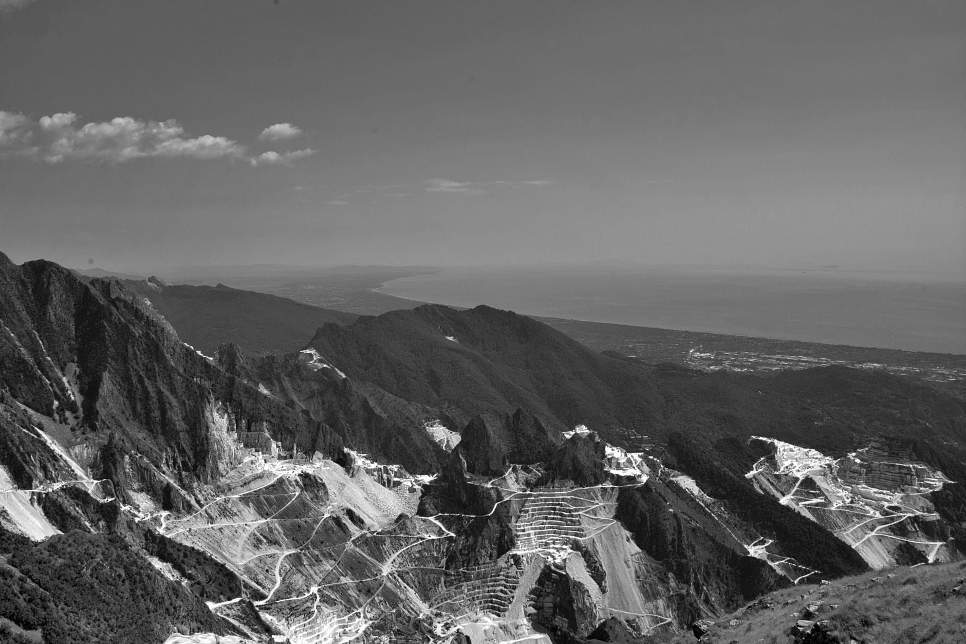 A breathtaking aerial view showcasing the grandeur of Carrara's marble quarries in Italy.